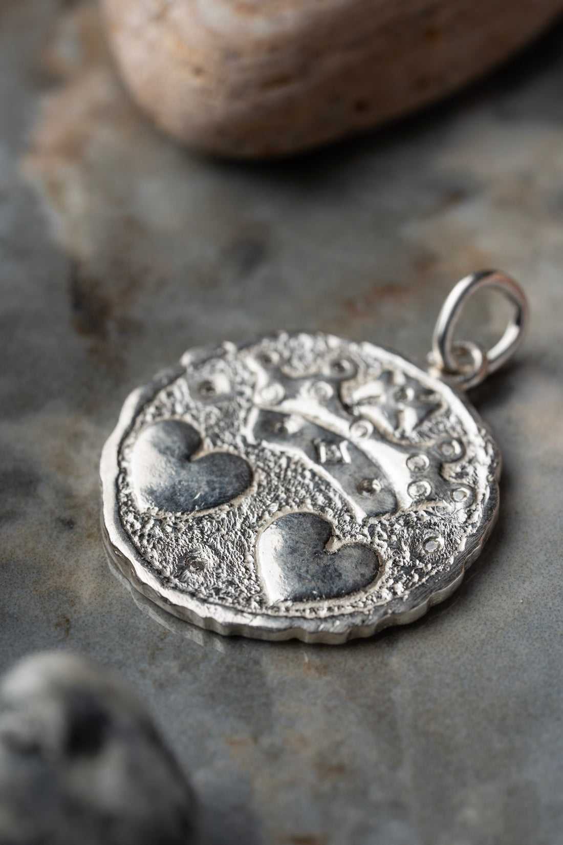 Colgante dos corazones