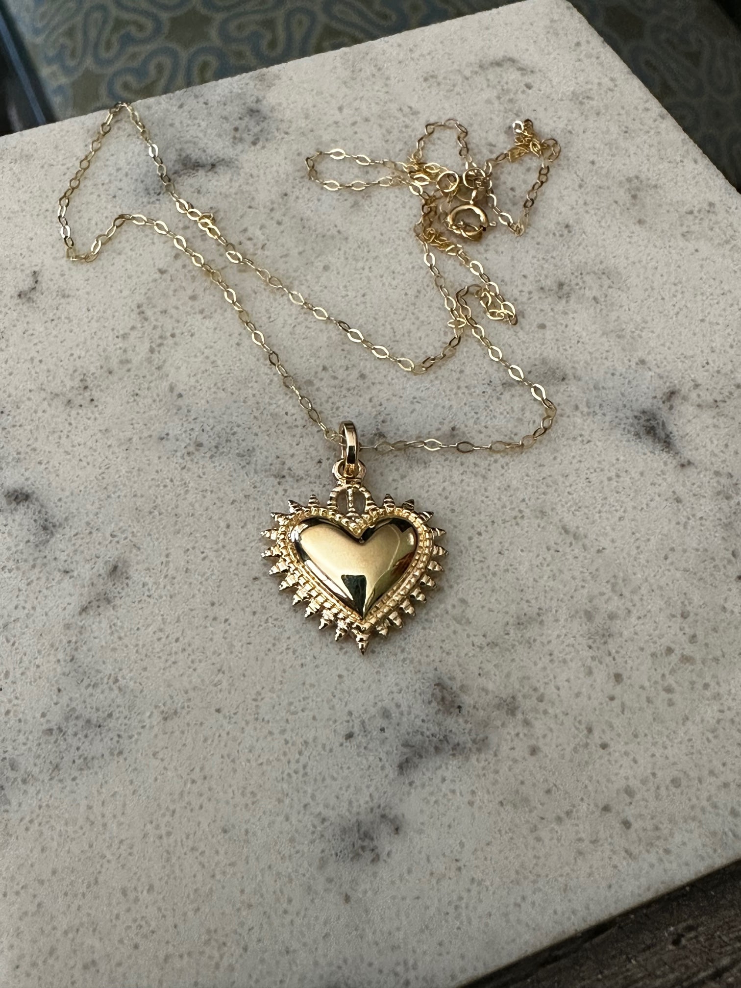 Corazón detente oro 18K