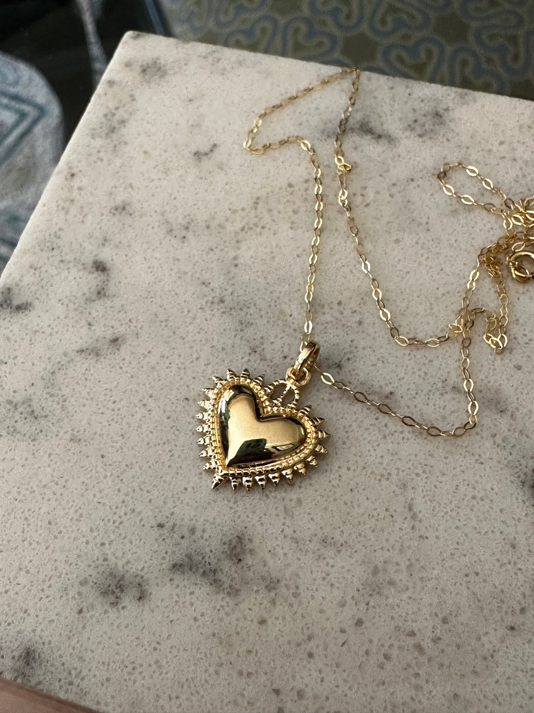 Corazón detente oro 18K