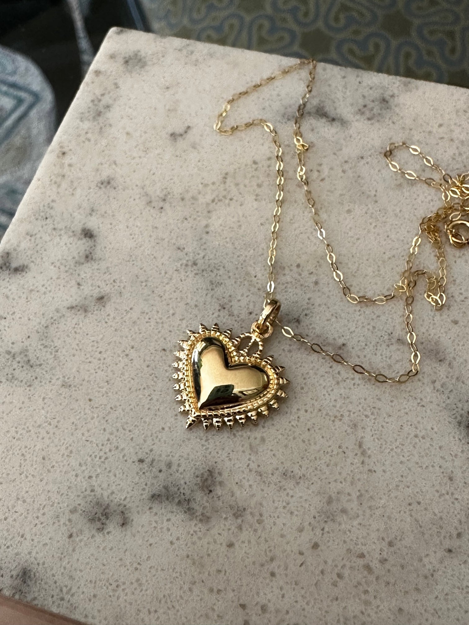 Corazón detente oro 18K