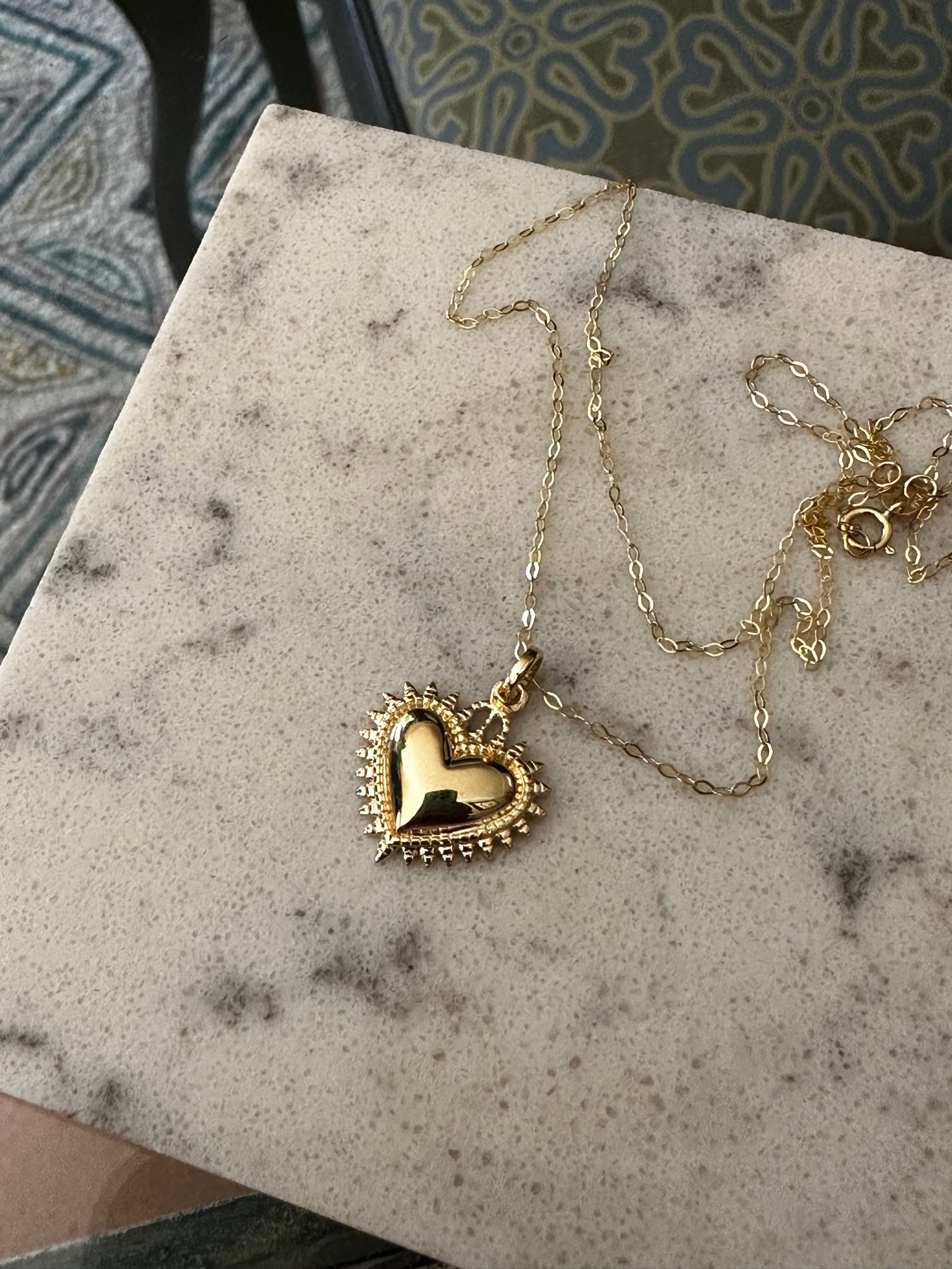 Corazón detente oro 18K