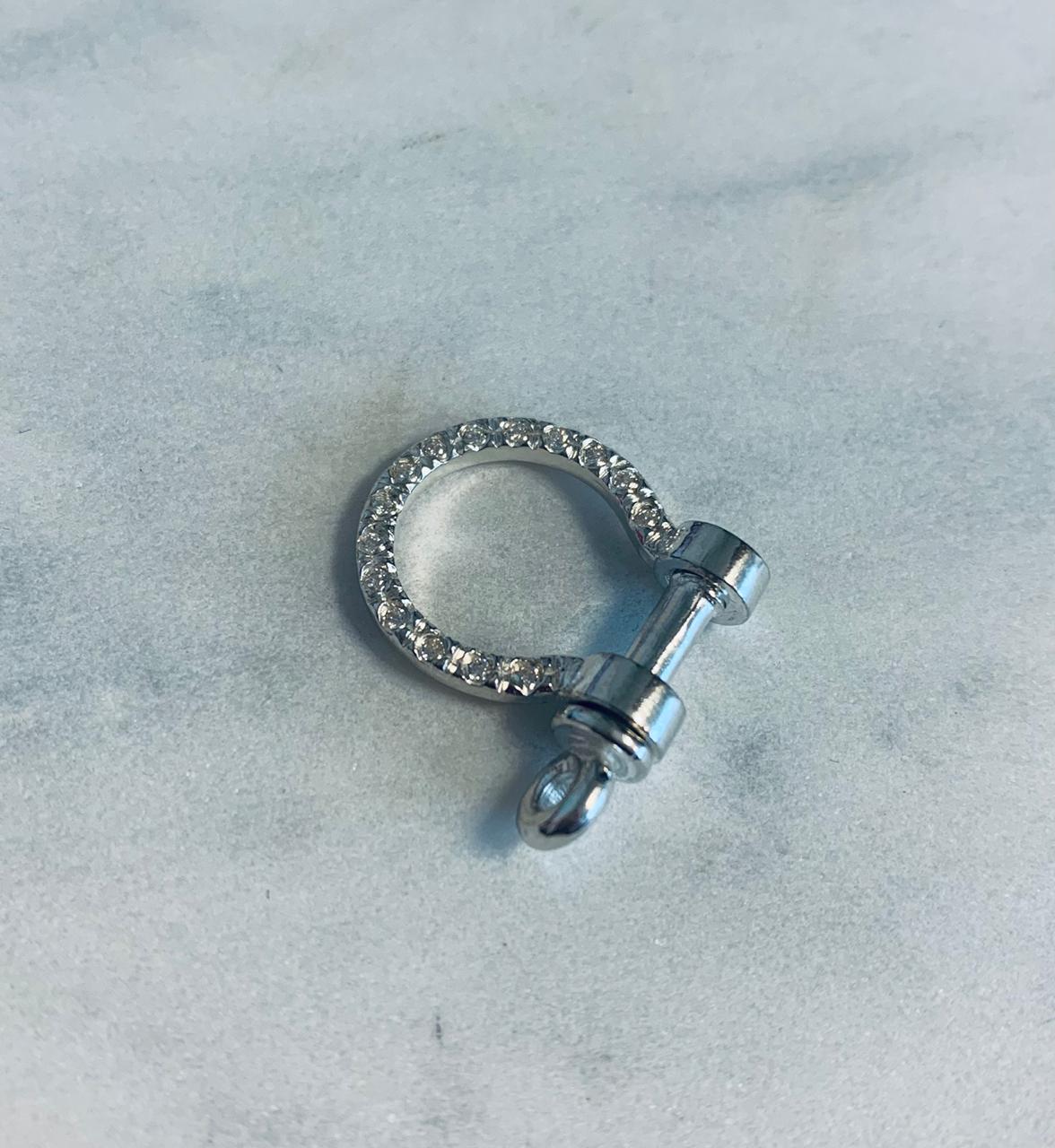 Broche Omega plata 950 y circones