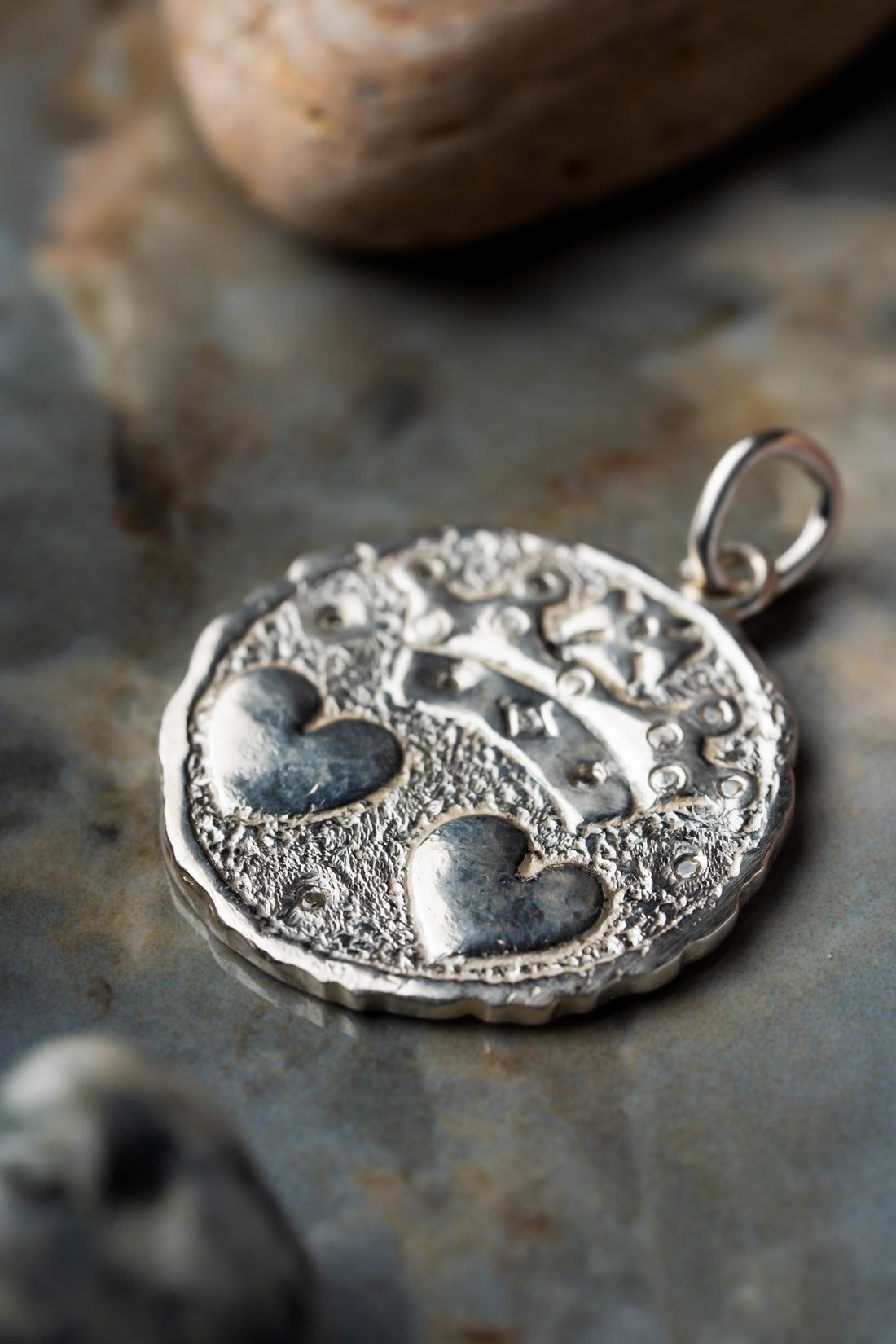 Colgante dos corazones