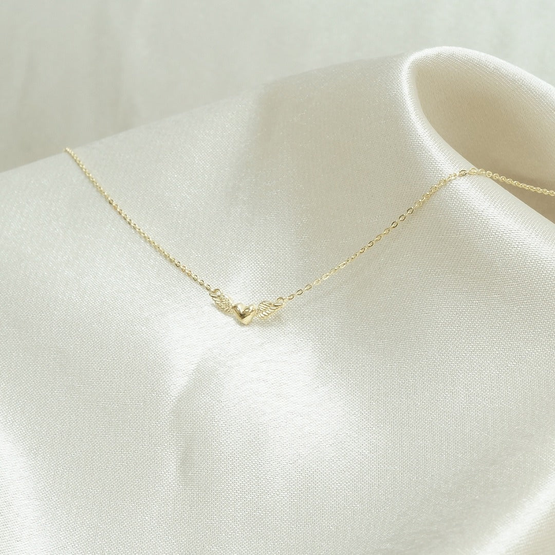 Collar corazon alado 18K