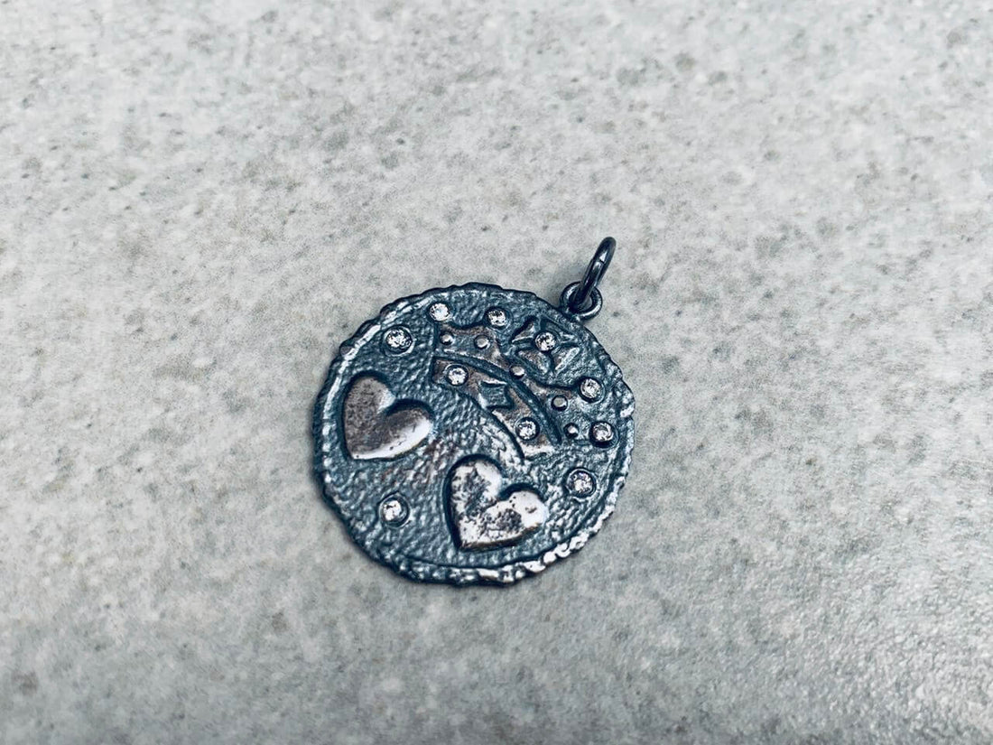 Colgante Dos Corazones Plata 950 envejecida